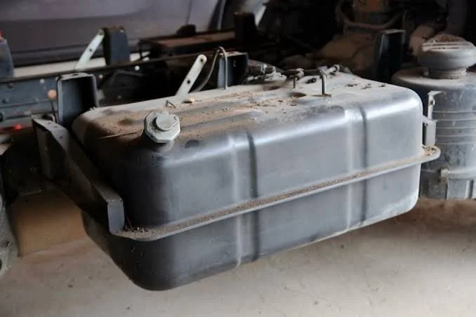 Step 2: Locate the fuel tank drain