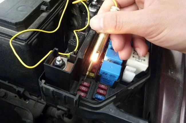Testing car fuses with a test light