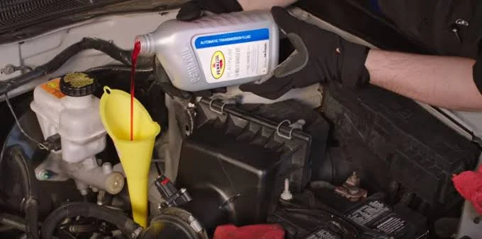 Can I change the transmission fluid myself?