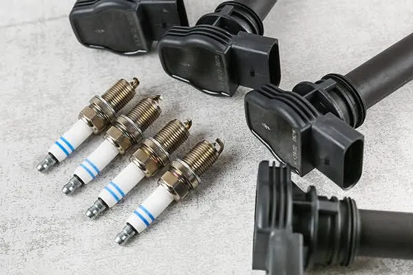 Spark Plug Change: Should You Also Replace Ignition Coils Too? (A Technician Explains)