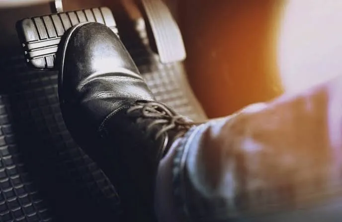 The Real Reason Resting Your Foot On The Brake Pedal Can Wreck Your Car
