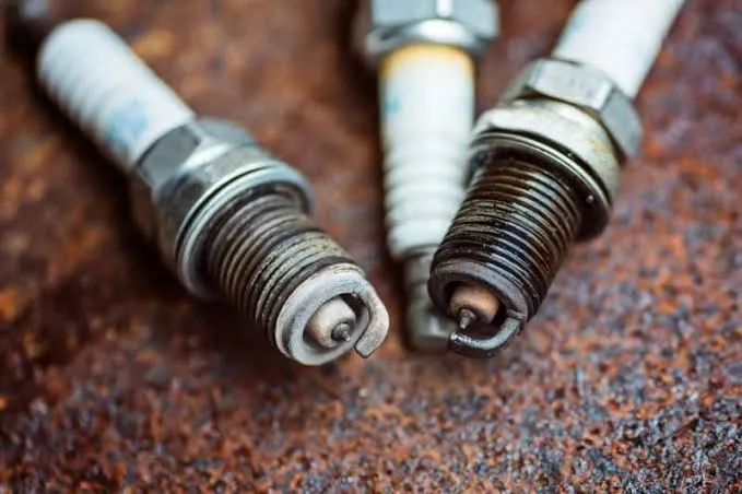 Is Your Car Burning Oil? Signs & Solutions for Oil on Spark Plug