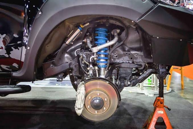 How can I determine if my shocks or struts need replacement?